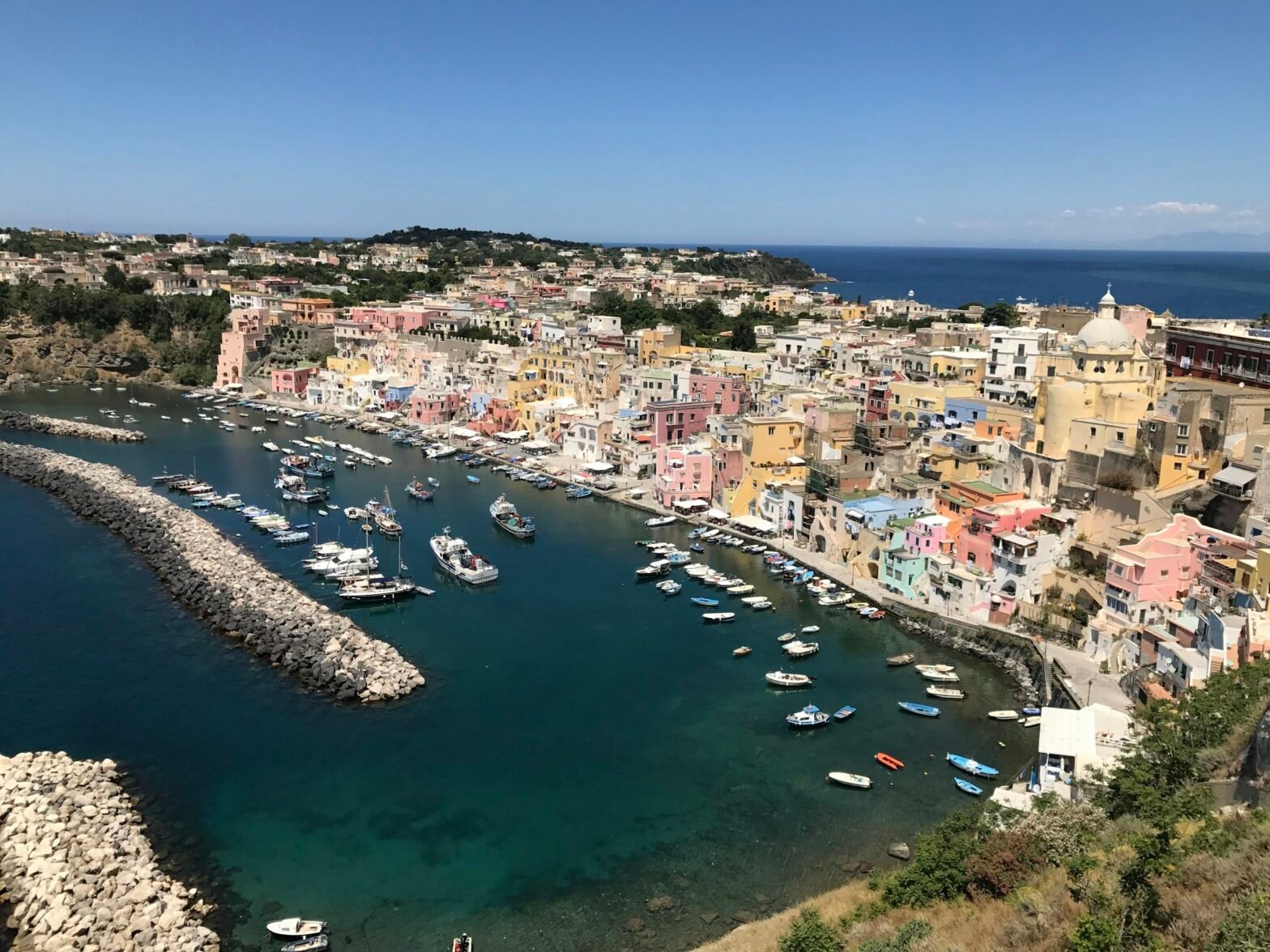 Colorful stacked houses of Marina Corricella on Procida island, a wedding destination near Naples