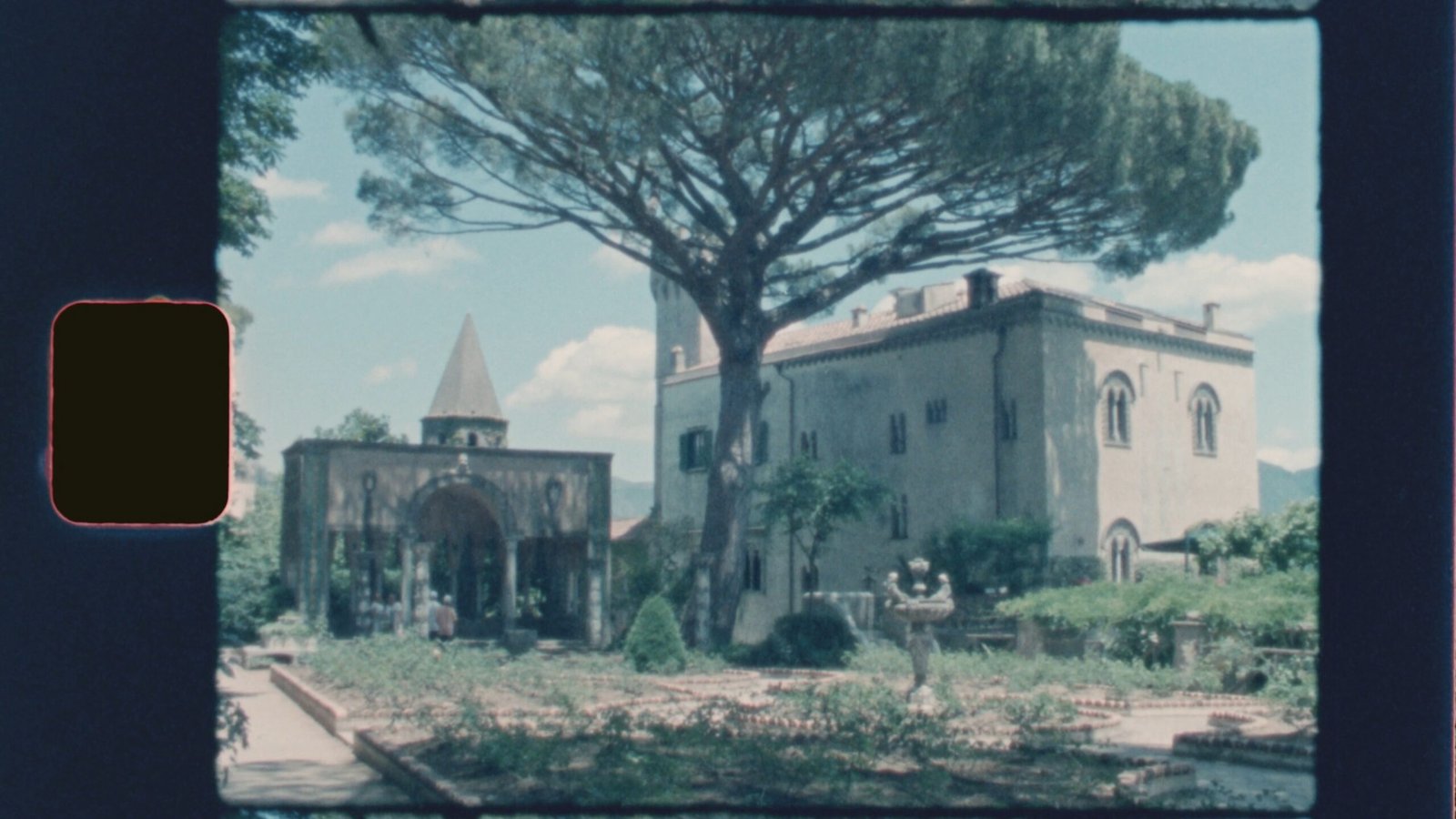 Super 8mm vintage film frame from a wedding shoot at Villa Cimbrone, Ravello (frame 11)